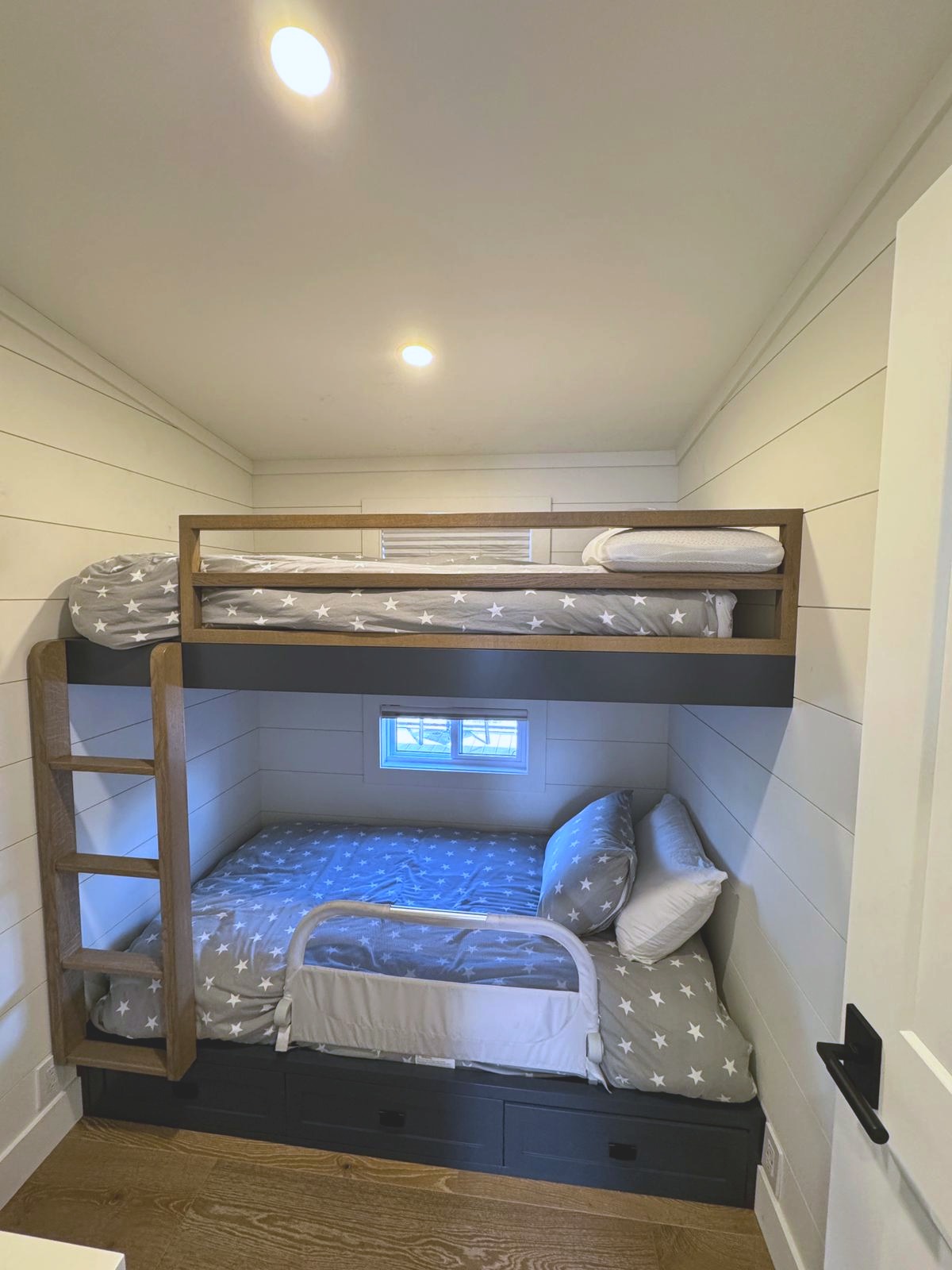 Second bunk room with custom millwork