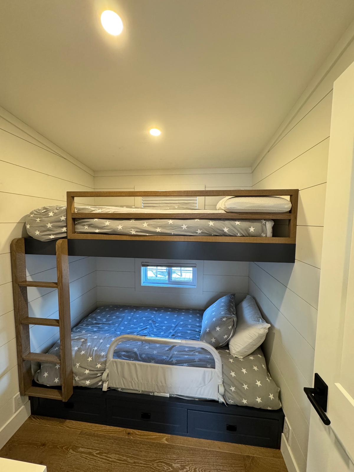 Second bunk room with custom millwork